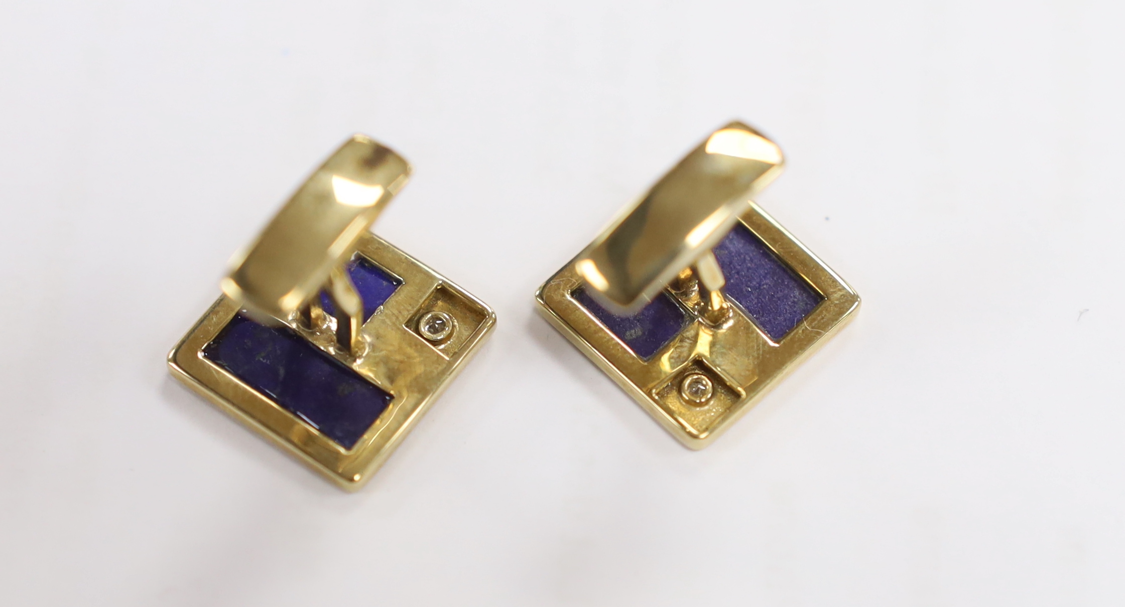 A modern pair of 9ct gold, lapis lazuli and diamond set square cufflinks, 16mm, gross weight 8.9 grams.